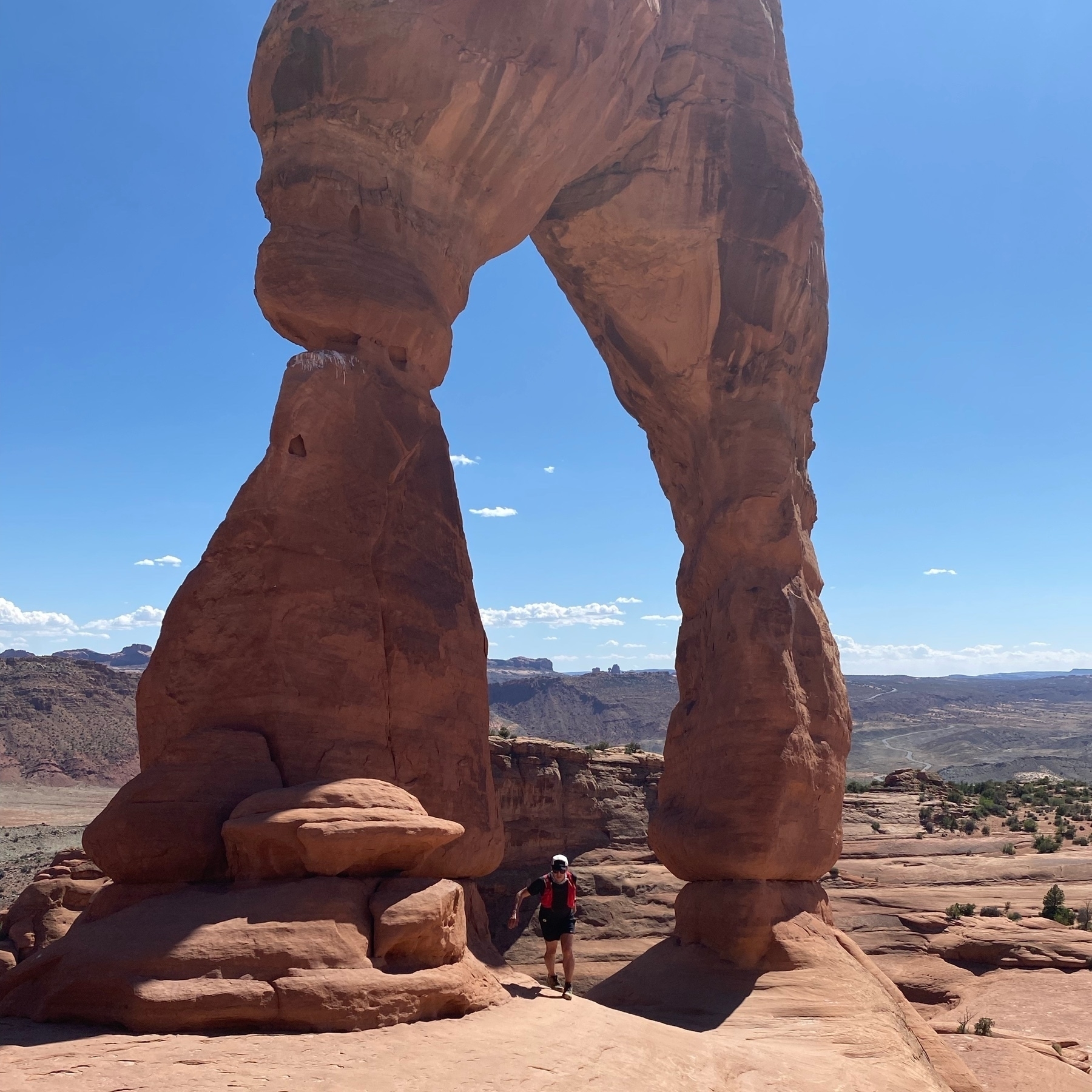 Aaron running at the Delicate Arch. 